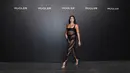 Aktris Amerika Serikat Lourdes Leon tiba pada pembukaan pameran Thierry Mugler: Couturissime di Brooklyn Museum, Brooklyn, New York City, Amerika Serikat, 15 November 2022. Putri Madonna itu memancarkan kepercayaan diri saat dia melangkah di depan kamera paparazzi di tempat bertabur bintang. (ANGELA WEISS/AFP)
