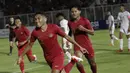 Pemain Timnas Indonesia U-19, Muhammad Fajar Fathur, merayakan gol yang dicetak le gawang Timor Leste pada laga Kualifikasi Piala AFC U-19 2020 di Stadion Madya, Jakarta, Rabu, (6/11/2019). Indonesia menang 3-1 atas Timor Leste. (Bola.com/M Iqbal Ichsan)