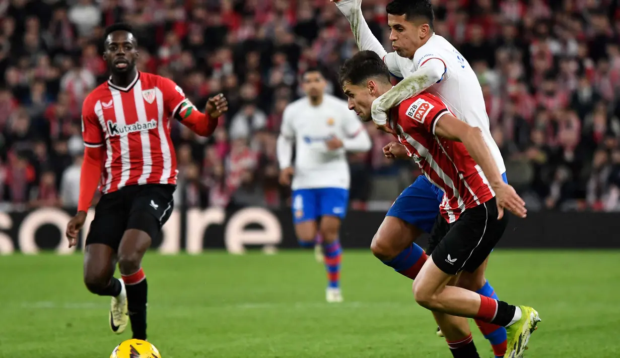 Athletic Bilbao dan Barcelona pun harus puas berbagi poin pada laga kali ini. (ANDER GILLENEA/AFP)