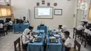 Suasana kegiatan Asesmen Nasional Berbasis Komputer (ANBK) di SDN Pulogadung 05 Pagi, Jakarta Timur, Selasa (25/10/2022). Kementerian Pendidikan Kebudayaan Riset dan Teknologi (Kemendikbud Ristek) secara serentak menggelar ANBK 2022 tingkat SD/MI atau sederajat yang bertujuan untuk melihat kemampuan sekolah secara keseluruhan dalam pelaksanaan pendidikan, dan tujuan akhirnya adalah untuk peningkatan mutu sekolah. (merdeka.com/Iqbal S. Nugroho)