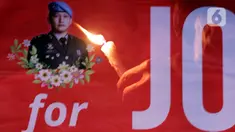 Foto multiple exposure menggambarkan peserta aksi yang menyalakan lilin dan spanduk bergambar Brigadir Novriansyah Joshua Hutabarat alias Brigadir J di kawasan Taman Ismail Marzuki (TIM), Jakarta, Senin (8/8/2022). Aksi tersebut bertajuk “Keadilan untuk Joshua! Aksi menyalakan 3000 lilin dan doa bersama mengenang kematian Brigadir J”. (Liputan6.com/Helmi Fithriansyah)