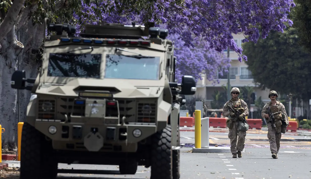 Dikabarkan akan ada sekitar 1.800 aksi protes yang dijadwalkan berlangsung di berbagai kota AS pada Sabtu (14/62025). Aksi tersebut bertepatan dengan parade militer di Washington untuk memperingati 250 tahun Angkatan Darat AS sekaligus ulang tahun Trump yang ke-79. (ETIENNE LAURENT/AFP)