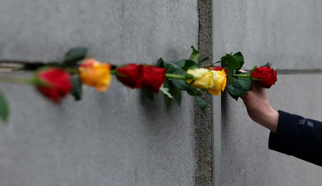 Runtuhnya Tembok Berlin menandai kebangkitan demokrasi dan kebebasan di Jerman. (Odd ANDERSEN/AFP)