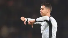 Portugal dipaksa bermain imbang tanpa gol oleh tuan rumah Skotlandia dalam duel lanjutan UEFA Nations League 2024/2025 Grup A1 di Hampden Park, Rabu (16/10/2024). Cristiano Ronaldo tampak frustrasi setelah kesulitan mencetak gol di laga tersebut. (AP Photo/Scott Heppell)