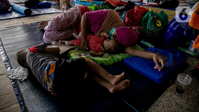 FOTO: Menengok Kondisi Pengungsi Banjir Cipinang Melayu