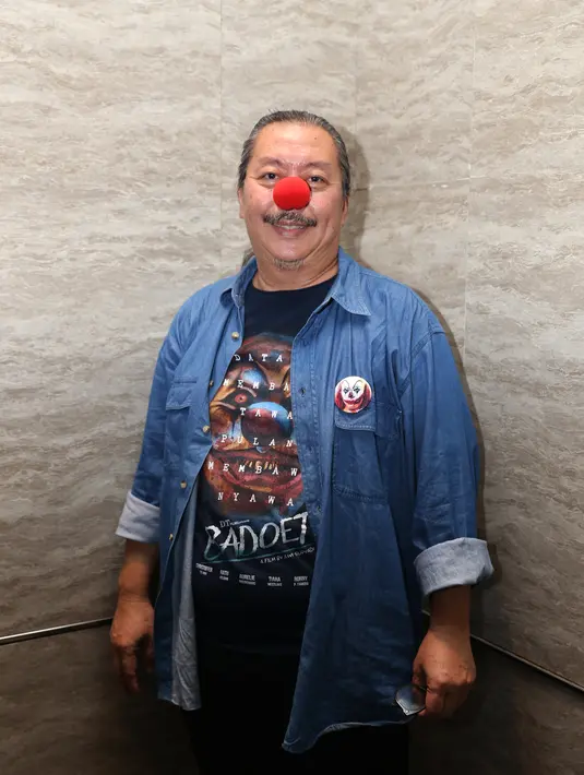 Ronny memandang perannya seperti dua sisi mata uang, punya dua sisi tapi tetap satu. Selain itu make up dan kostumnya mendukung sehingga memudahkannya ketika harus berakting lucu dan ketika harus tampil menyeramkan sebagai badut. (Andy Masela/Bintang.com)