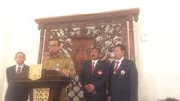 Gubernur DKI Jakarta Anies Baswedan usai melantik pengurusan KONI DKI Jakarta (Liputan6.com/Delvira Chaerani)