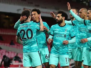 Kedua tim bermain imbang tanpa gol pada babak pertama. Namun, Liverpool mampu mencetak tiga gol pada babak kedua melalui Diogo Jota (dua gol) dan Mohamed Salah. (Foto: AFP/Pool/Catherine Ivill)