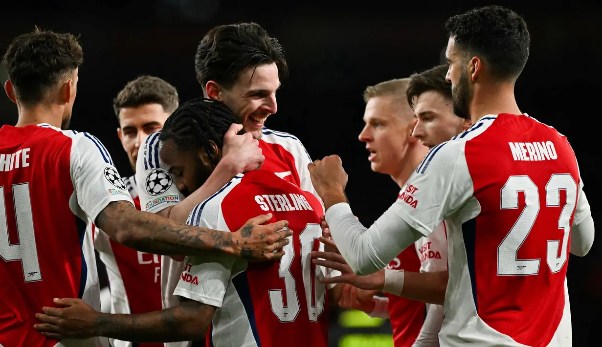 Berlaga pada leg kedua 16 besar Liga Champions 2024/2025, Arsenal dan PSV Eindhoven bermain imbang 2-2. (Glyn KIRK/AFP)