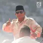 Calon Presiden nomor urut 02 Prabowo Subianto menyampaikan orasi politiknya dalam kampanye akbar Prabowo-Sandi di Stadion Utama Gelora Bung Karno (SUGBK), Jakarta, Minggu (7/4). Sejumlah tokoh nasional pendukung Prabowo - Sandiaga pun turut hadir. (Liputan6.com/Herman Zakharia)