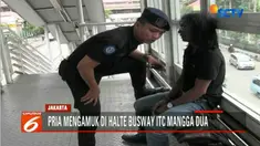 Tidak hanya merusak pintu masuk dan handle rotari dengan cara ditendang, pria ini sempat menantang petugas halte untuk berkelahi.