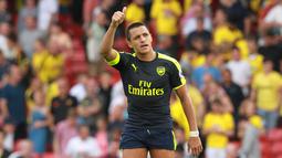 Pemain Arsenal, Alexis Sanchez mencetak satu gol saat Arsenal dijamu Watford pada lanjutan liga Inggris pekan ke-3 di Vicarage Road Stadium (27/8/2016). Arsenal menang 3-0.(AFP/Sean Dempsey)