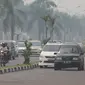 Kabut asap di Kota Pekanbaru membuat udara tak sehat untuk dihirup (Liputan6.com/M Syukur)