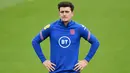 Sempat ada kekhawatiran Harry Maguire akan absen dalam Euro 2020. Namun, sang pemain tetap masuk dalam 26 nama pemain yang dibawa Gareth Bale ke Euro 2020, tapi tidak tampil dalam dua laga pemanasan Timnas Inggris saat menghadapi Austria dan Romania. (Foto: AFP/Justin Tallis)