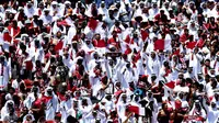 Para penggemar Qatar bersorak di tribune selama pertandingan Grup B Piala Dunia 2026 antara Qatar dan Swiss di Stadion San Francisco Bay Area pada 13 Juni 2026 di Santa Clara, California. (Emilee Chinn/Getty Images via AFP)