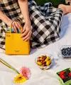 Memasuki musim gugur 2021, Kate Spade New York menghadirkan siluet handbag Lane yang terbaru, yaitu klasik dengan material durable. Mempersiapkan perempuan untuk kembali beraktivitas, Lane akan menjadi pilihan terbaik. Foto: Document/Kate Spade New York.