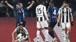 Berstatus tim tamu, Atalanta sukses mempermalukan Juventus dengan skor telak 4-0. (Isabella BONOTTO/AFP)