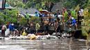 Hujan yang turun dengan intensitas tinggi terjadi sejak Selasa (9/9/2025) kemarin, dan tidak berhenti sampai hari ini Rabu (10/9/2025). (SONNY TUMBELAKA/AFP)