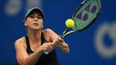 Pemain Belinda Bencic asal Switzerland saat beraksi di China Open tennis tournament, Beijing, Selasa (06/10/2015). (AFP Photo / Wang Zhao)