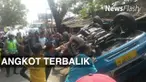 Sebuah angkutan kota (angkot) sarat penumpang terbalik di jalan Raya Leuwiliang-Jasinga, Bogor. Akibat kejadian itu, tiga orang yang merupakan satu keluarga meninggal di lokasi.