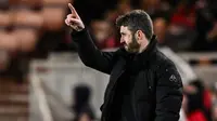 Manajer Middlesbrough asal Inggris, Michael Carrick, bereaksi selama pertandingan sepak bola leg pertama semifinal Piala Liga Inggris antara Middlesbrough dan Chelsea di Stadion Riverside di Middlesbrough, timur laut Inggris pada 9 Januari 2024. (Oli SCARFF/AFP)