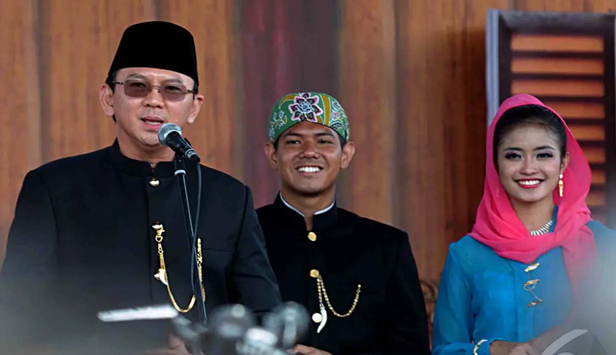 Ahok sempat mencandai H. Lulung ketika sambutan dengan menyebut H. Lulung sebagai teman sparing (berlatih tinju), Jakarta, Minggu (14/9/2014) (Liputan6.com/Faisal R Syam)