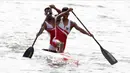 Pasangan Indonesia, Anwar Tara dan Yuda Firmansyah, saat beraksi pada SEA Games 2019 cabang kano nomor 1000 meter putra di Subic, Filipina, Jumat (6/12/2019). Pasangan Indonesia berhasil meraih medali emas. (Bola.com/M iqbal Ichsan)