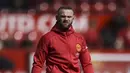 Kepergian Wayne Rooney tidak lepas dari minimnya kesempatan bermain di MU pada musim lalu. (AFP/Oli Scarff)