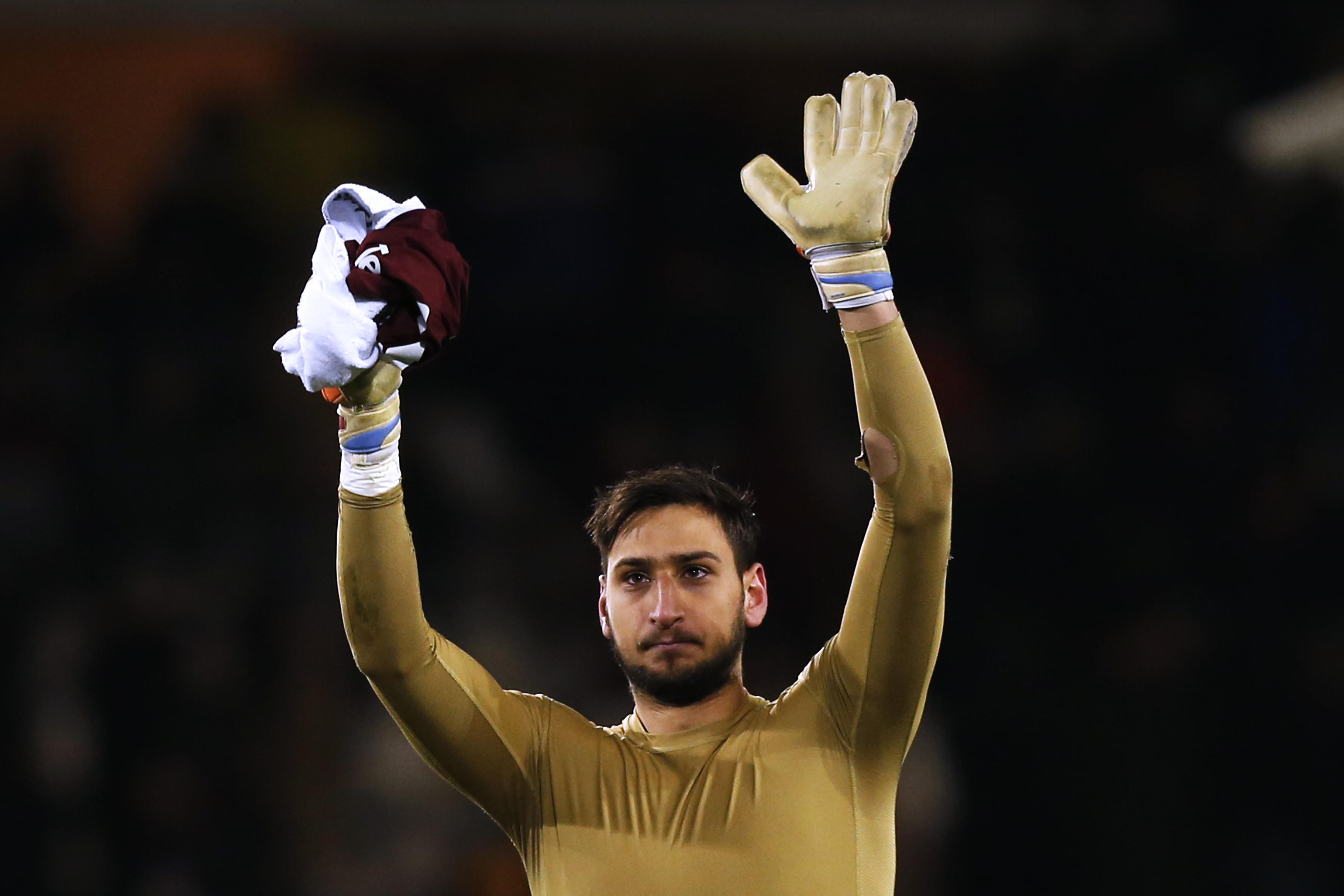 Kiper AC Milan, Gianluigi Donnarumma. (MARCO BERTORELLO / AFP)