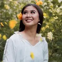 ilustrasi perempuan tersenyum/Photo by Rheyan Glenn Dela Cruz Manggob from Pexels