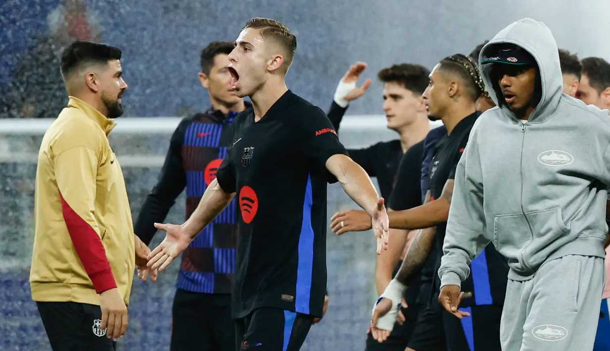 Espanyol yang merupakan rival sekota berusaha meredam pesta juara Barcelona dilakukan di markas mereka. (AP Photo/Joan Monfort)