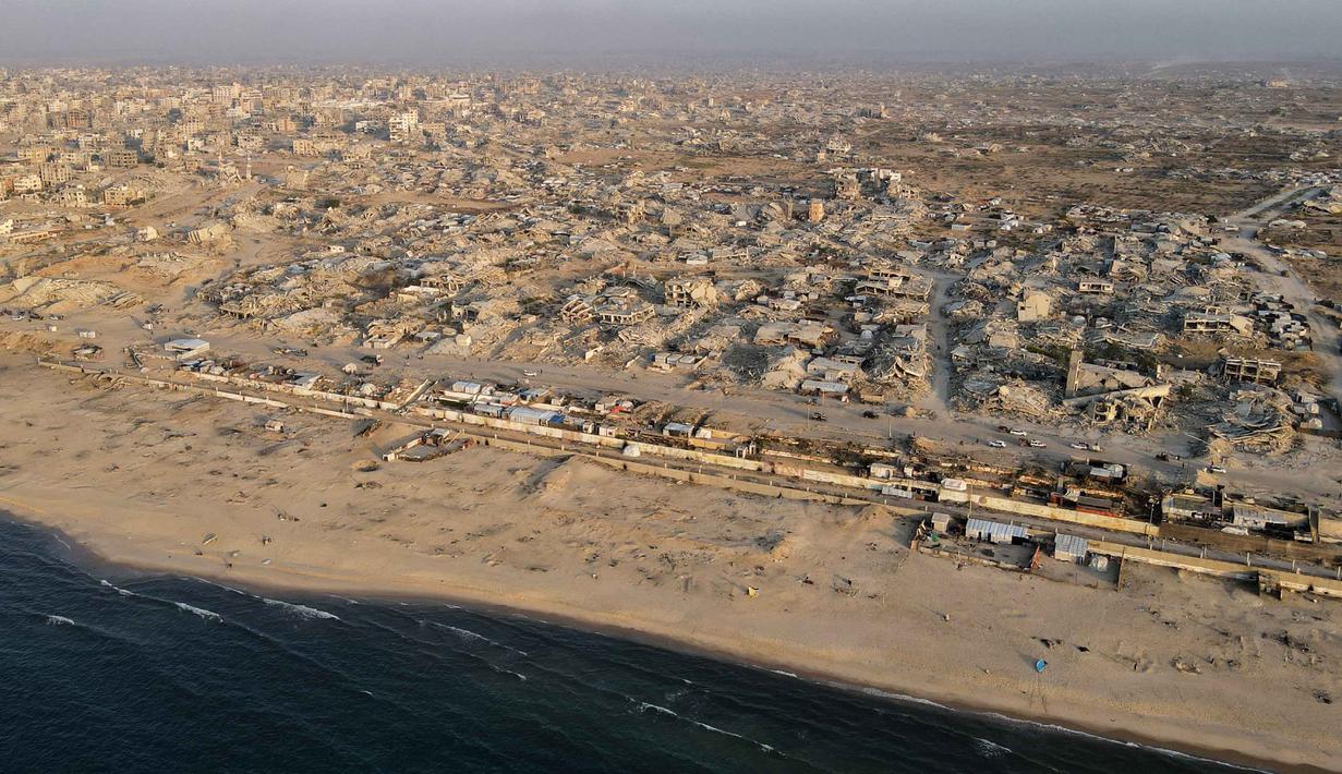 Pada tahap pertama, akan difokuskan pada pemenuhan kebutuhan kemanusiaan dan infrastruktur yang mendesak, akan berlangsung selama enam bulan dengan biaya USD 3,5 miliar. (Foto oleh AFP)