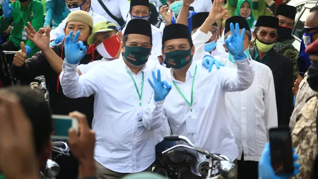 Paslon Oji-Zaini sempat terpapar Covid-19, namun sekarang sudah sembuh. (Foto: Liputan6.com/Rudal Afgani Dirgantara)