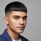 7 Model Rambut Pria Pendek untuk Dahi Lebar, Tampil Lebih Proporsional dan Percaya Diri Sepanjang Hari (Foto: Gemini AI)