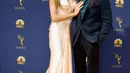Model senior Heidi Klum dan pacarnya, Tom Kaulitz saat menghadiri Emmy Awards 2018 di Los Angeles, AS, Senin (17/9). Sebelumnya Heidi telah menikah selama sembilan tahun, namun pernikahannya kandas dengan perceraian. (VALERIE MACON/AFP)