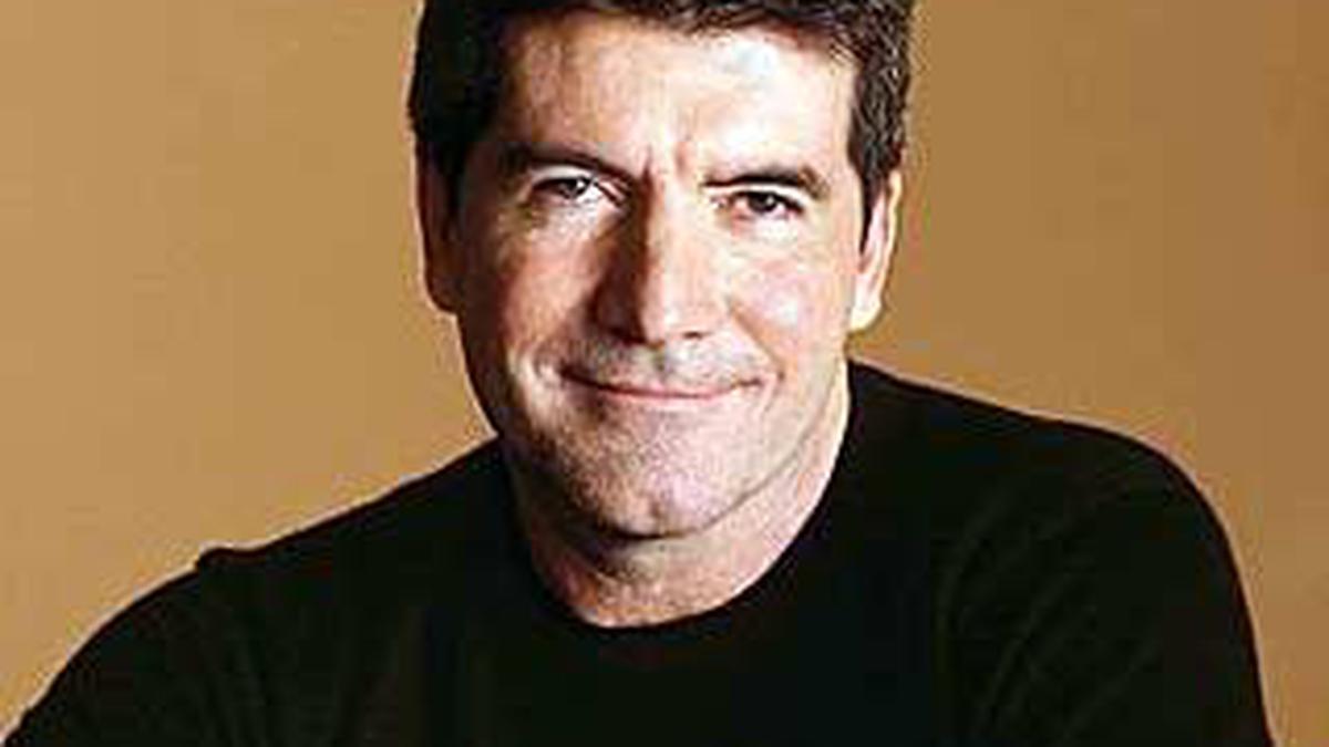 Lagi, Simon Cowel Bikin Boy Band
