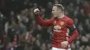 7. Wayne Rooney merupakan kapten Manchester United di rentang 2014-2017.(AFP/Oli Scarff)