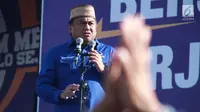 Mantan Menteri Perdagangan Rachmat Gobel memberikan sambutan saat menghadiri Kampanye Rapat Umum di Gorontalo, Minggu (24/3). Partai Nasdem mengawali Kampanye Terbuka di Provinsi Gorontalo. (Liputan6.com/Arfandi Ibrahim)