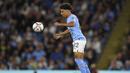 Rico Lewis. Bek kanan Inggris milik Manchester City U-21 ini menjadi pemain termuda ketiga yang melakukan debut di Liga Inggris musim 2022/2023. Ia berusia 17 tahun, 8 bulan dan 23 hari saat diturunkan pelatih Pep Guardiola pada pekan ke-2 (13/8/2022) melawan tamunya Bournemouth. Dalam laga yang dimenangi The Citizens 4-0 tersebut, ia masuk menggantikan Kyle Walker pada menit ke-82. (AFP/Oli Scarff)