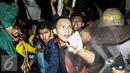 Suasana saat massa melakukan aksi yang berujung bentrok dengan polisi menggelar aksi unjuk rasa di depan Istana Negara, Kamis (12/1). (Liputan6.com/Faizal Fanani)