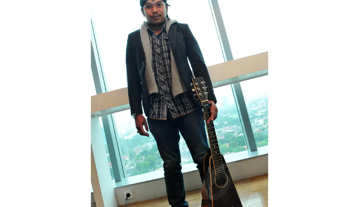 Mantan pengamen ini pun sempat mengisi salah satu program religi bersama Ustad Yusuf Mansyur dan Denny Cagur sampai akhirnya menjadi salah satu peserta The Voice Indonesia di 2013. (Liputan6.com/Andrian M Tunay)