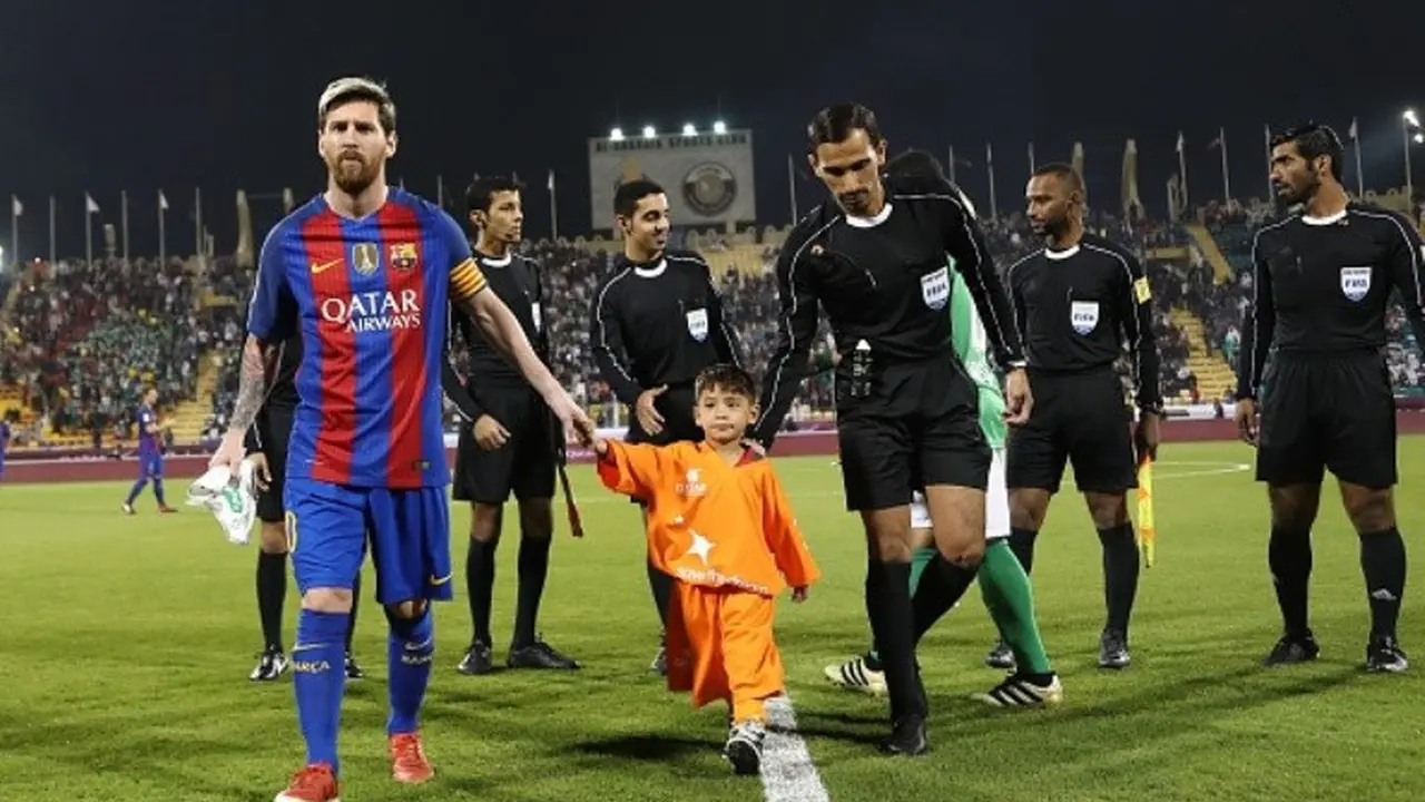 Lionel Messi dan Murtaza Ahmadi