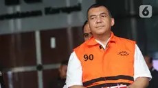 Mantan Wakil Menteri Imigrasi dan Pemasyarakatan (Imipas), Silmy Karim, usai menjalani pemeriksaan di Gedung Merah Putih Komisi Pemberantasan Korupsi (KPK), Senin (8/6/2026). Ini merupakan pemeriksaan perdana Silmy Karim setelah ditetapkan sebagai tersangka dan ditahan KPK pada 4 Juni 2026. (Liputan6.com/Helmi Fithriansyah)