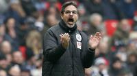 Pelatih Huddersfield Town asal Jerman, David Wagner lahir di Geinsheim am Rhein 19 Oktober 1971, Wagner melakukan debut di Premier League  pada  12 August 2017 dengan kemenangan 3-0 atas Crystal Palace. (AFP/Ian Kington)