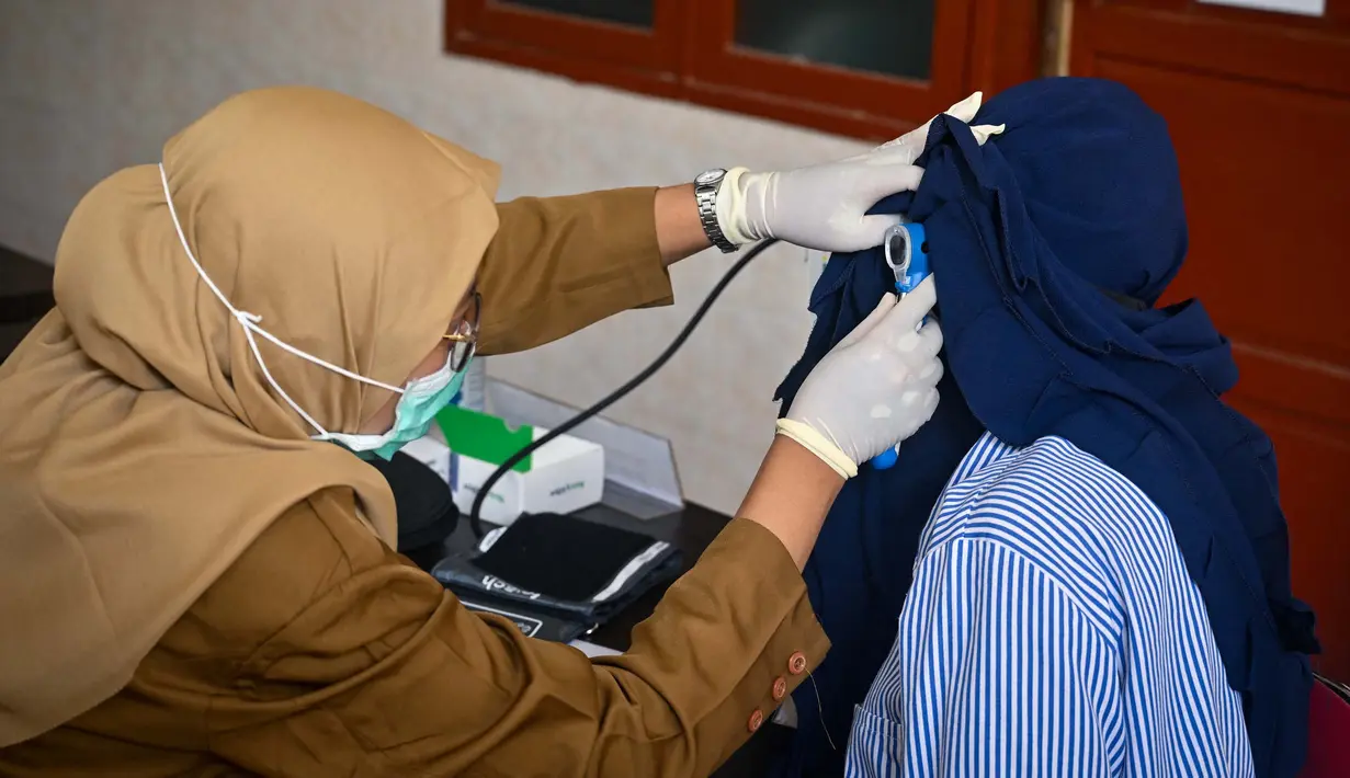 Program Pemeriksaan Kesehatan Gratis ini mencakup berbagai jenis penyakit yang bisa dicegah melalui deteksi dini. (JUNI KRISWANTO/AFP)