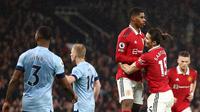 Marcus Rashford mencetak gol kemenangan Manchester United atas Brentfrod pada laga tunda pekan ke-25 Liga Inggris 2022/2023 di Old Trafford, Kamis (6/4/2023). (AFP/Daren Staples)