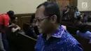 Wasekjen Partai Golkar, M Sarmuji usai menjadi saksi pada sidang dugaan suap kesepakatan kontrak kerja sama pembangunan PLTU Riau-1 dengan terdakwa Eni Maulani Saragih di Pengadilan Tipikor, Jakarta, Selasa (8/1). (Liputan6.com/Helmi Fithriansyah)