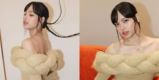 Lihat di sini beberapa potret penampilan cute Lisa BLACKPINK pakai knitted dress pamer kulit glowing.