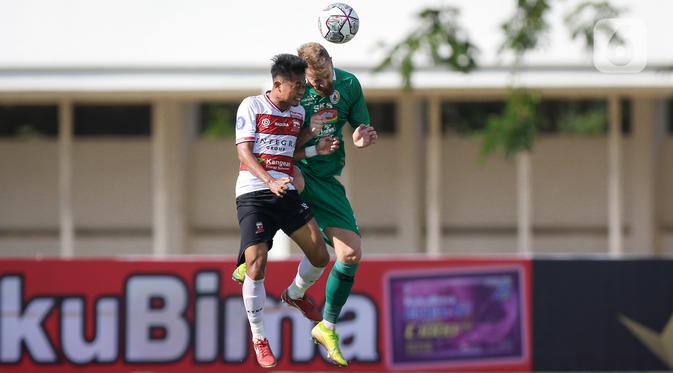 032017100_1632567935-20210925-Madura-United-vs-PSS-Sleman-BOLA-3
