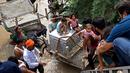 Ibukota New Delhi juga telah disiagakan tinggi untuk banjir setelah sungai Yamuna, yang melewati megacity, mencatat level tertinggi sejak 1978. (AFP/Arun Sankar)